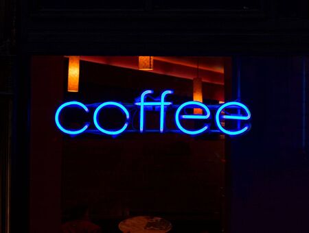 Coffee neon sign glowing blueの写真素材