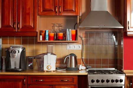 Kitchen with wooden cupboards and cabinetsの写真素材