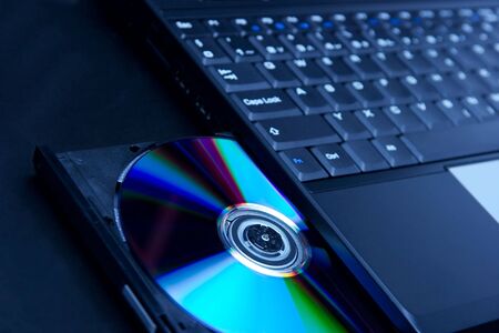 Laptop with open CD trayの写真素材
