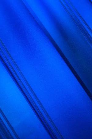 Blue abstract background with diagonal linesの写真素材