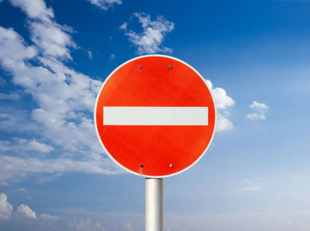 No entry traffic sign against blue skyの写真素材