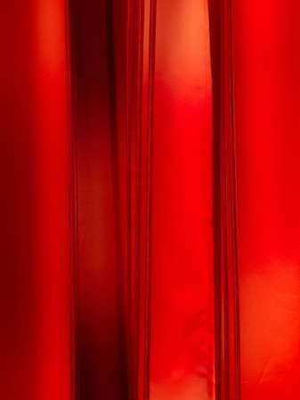 Red curtain background with stripesの写真素材