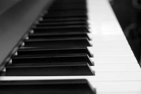 Piano keyboard viewed from the sideの写真素材