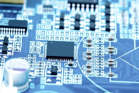 Circuit board with lots of electronic componentsの写真素材