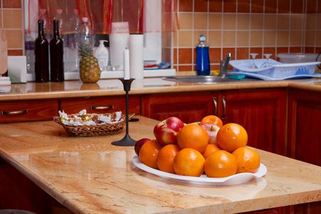 Kitchen interior with fruits on the tableの写真素材