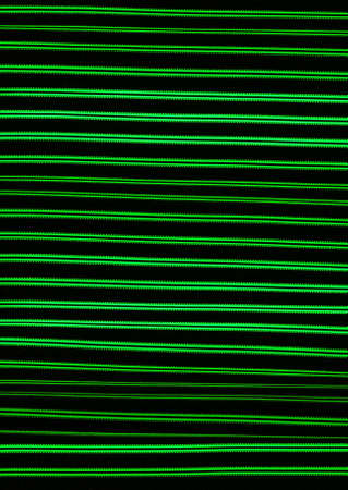 Abstract background with green stripes on blackの写真素材