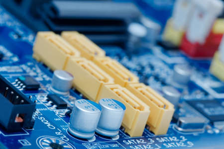 Computer mainboard with lots of electronic componentsの写真素材