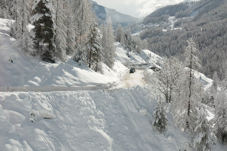 Road in winter covered by snow