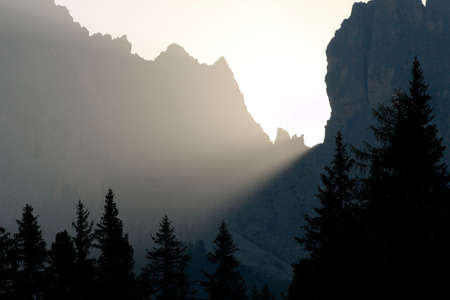 Sunlight beam shining through rock formationsの写真素材