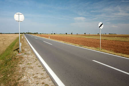 Road going through a rural areaの写真素材