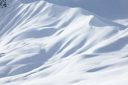 Mountains covered with fresh snowの写真素材