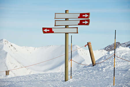 Blank direction signs in a ski resort の写真素材