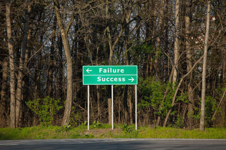 Direction sign at a crossroadsの写真素材