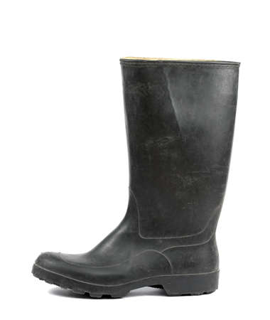 Black rubber boots isolated on white backgroundの写真素材