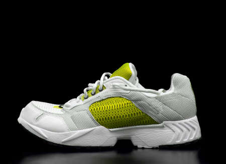 Training shoe closeup, black backgroundの写真素材