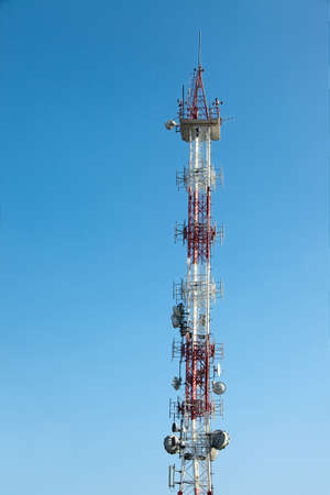 Transmitter tower against clear blue skyの写真素材