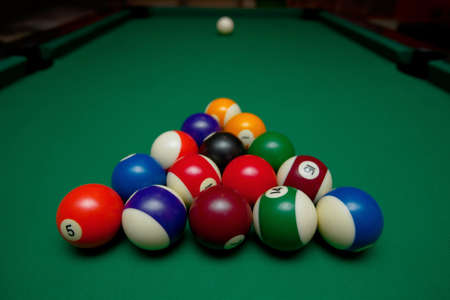 Pool table set up for beginningの写真素材
