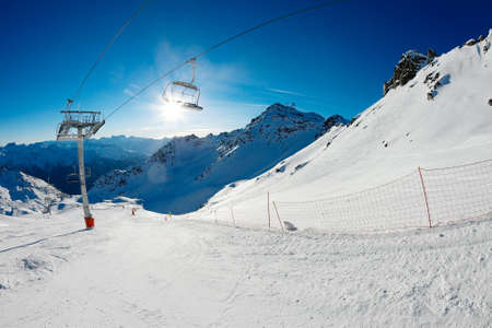 Ski slope with chairliftの写真素材