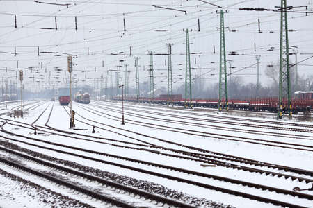 Industrial railroad station in snowの写真素材