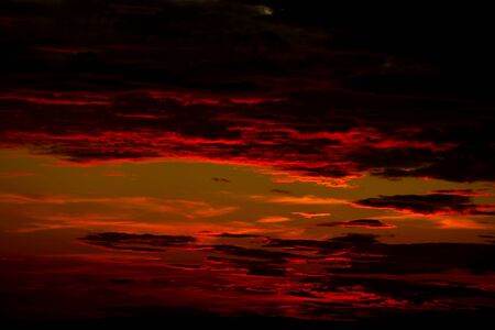 Sunset sky with dark cloudsの写真素材