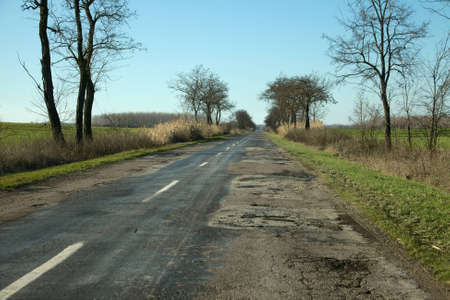Bad quality road in the countrysideの写真素材