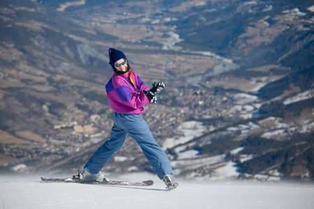 Female on the top of the slopeの写真素材
