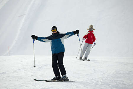 Skiers coming down the trackの写真素材