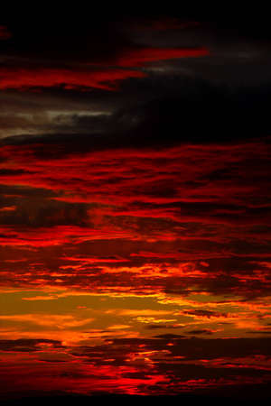 Dramatic sunset sky with spectacular cloudsの写真素材
