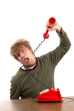 Man hanging himself with a phone cordの写真素材