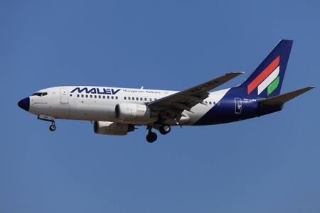 BUDAPEST, HUNGARY - OCTOBER 02 2011: Malev Hungarian Airlines Boeing 737 on final approach. Malev ceased all flying activity on 3 February 2012, after 66 years of service, のeditorial素材