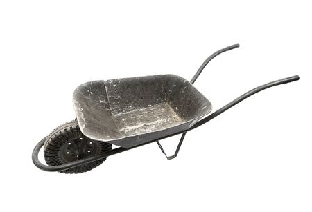 Black wheelbarrow isolated on whiteの写真素材