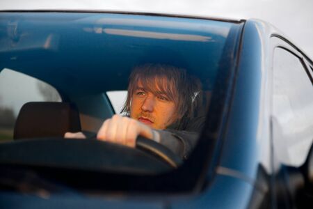 Man driving a carの写真素材