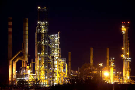 Oil refinery building at nightの写真素材