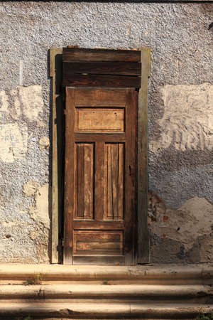 Door of an old abandoned buildingの写真素材