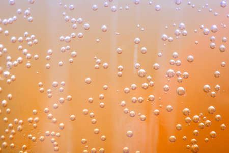 Shiny bubble in a liquid bottleの写真素材