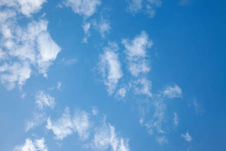 Small white clouds in the blue skyの写真素材