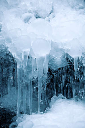Ice of a frozen waterfallの写真素材
