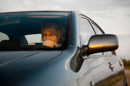 Man driving a car recklesslyの写真素材