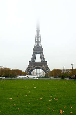 The Eiffel Tower with the top disappearing in the fogの写真素材