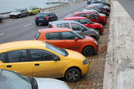 Man cars parking on the roadsideの写真素材
