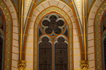 Gothic cathedral interior with decorated windowの写真素材