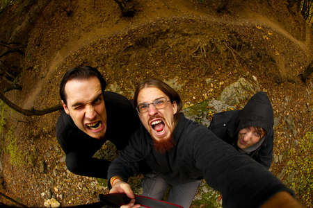 Crazy guys lurking in the forestの写真素材