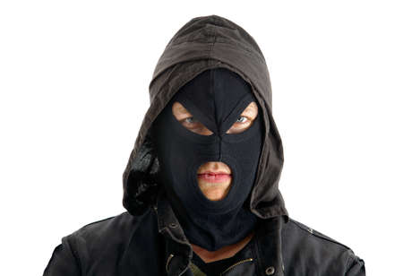 Aggressive masked figure ready to commit crimesの写真素材