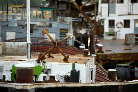 Old rusty shipwrecks, closeup on an anchorの写真素材