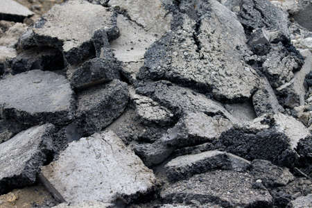 Broken asphalt surface of a road reconstructionの写真素材