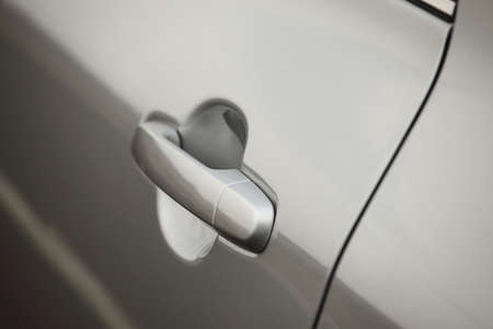 Closeup of a car door handleの写真素材