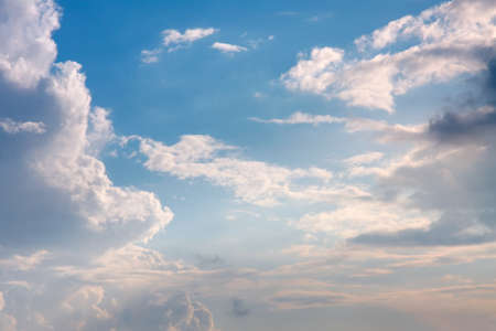 Bright clouds in the blue skyの写真素材