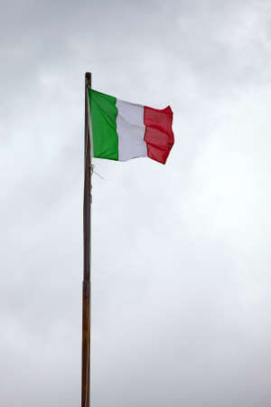 Italian national flag on a mastの写真素材