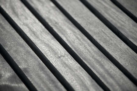 Angled lumber background with shallow DoFの写真素材