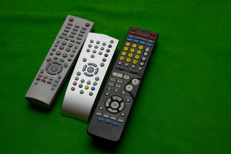 Remote controls on a couch